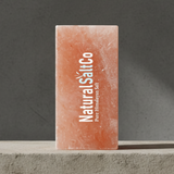 Rectangular pink salt block with 'Natural Salt Co' branding on a gray background