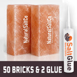 Two blocks of Natural SaltCo Pure Himalayan Salt and a tube of Natural SaltCo Glue on a white background.