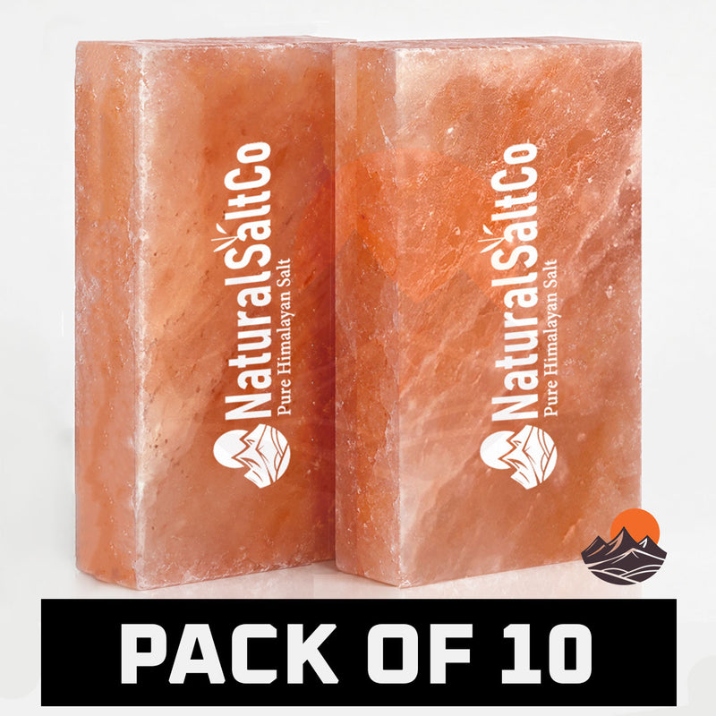 Two rectangular pink Himalayan salt bars with white 'NaturalSaltCo' branding, shown on a white background with a black banner at the bottom reading 'PACK OF 10'.