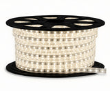 Spool of LED strip light on a white background