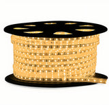 Spool of LED strip light on a white background
