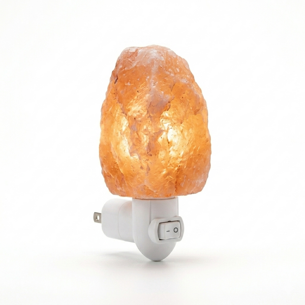 Himalayan salt lamp with a white base on a white background