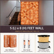 Himalayan salt wall kit with salt bricks, glue, and LED strip light on a promotional background.