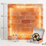 Himalayan salt lamp with LED strip lights and glue on a white background